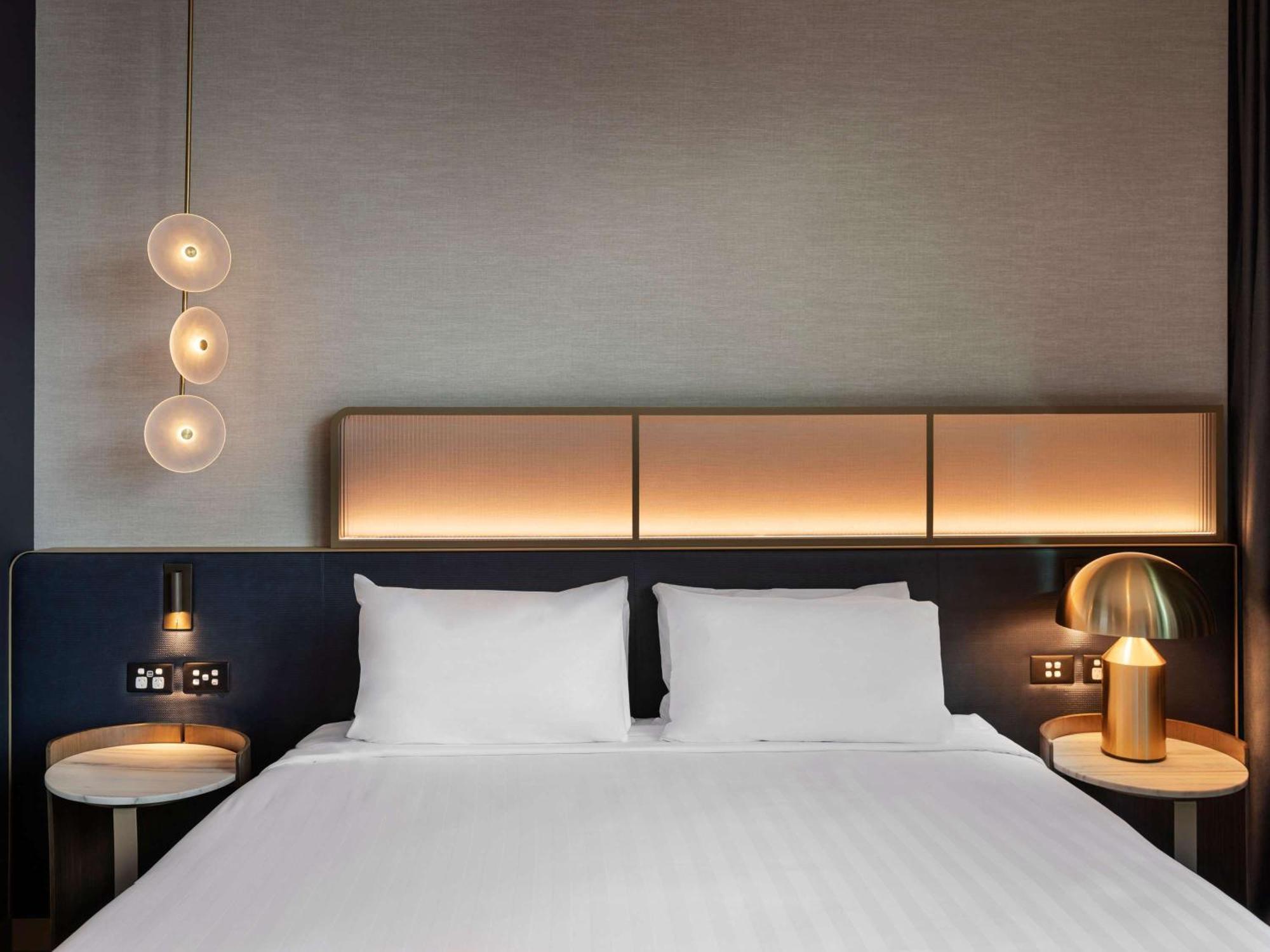 Hotel Pullman Auckland Airport Exteriér fotografie A bedroom at the hotel